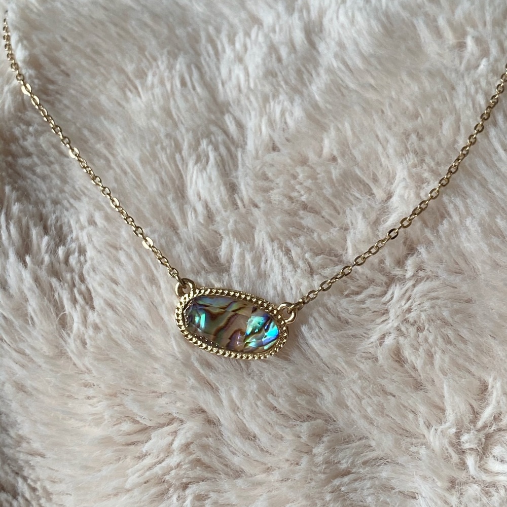 Gold necklace with multi color stone